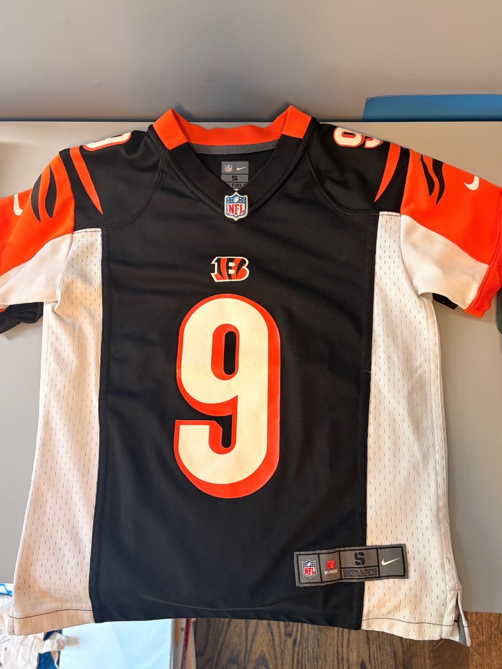 NFL Black Jersey with Orange Collar Trim - Picture 2 of 3